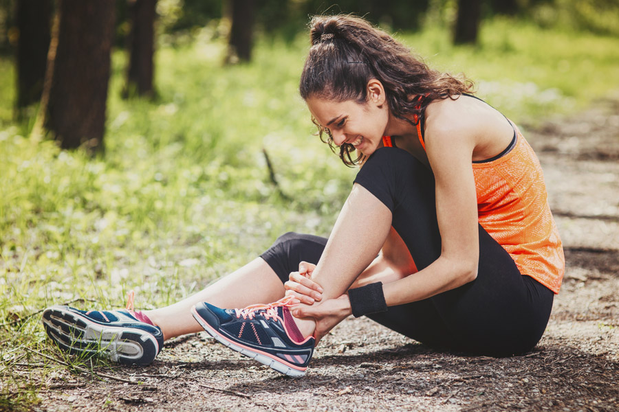runner holding ankle