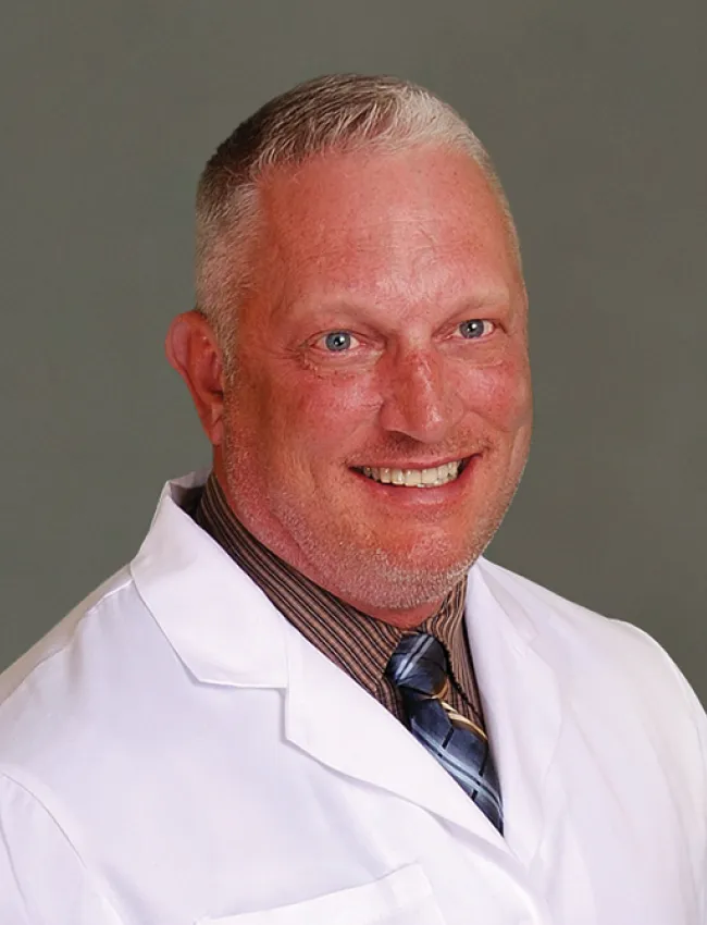 J. Travis Burt, M.D., F.A.A.N.S., F.A.C.S.