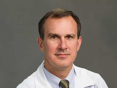 T. Lisle Whitman, M.D.